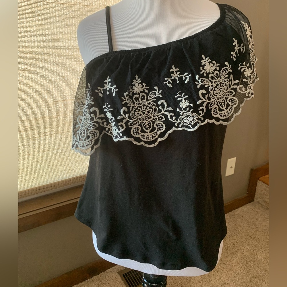 Maurice’s off-one-shoulder blouse with spaghetti strap.